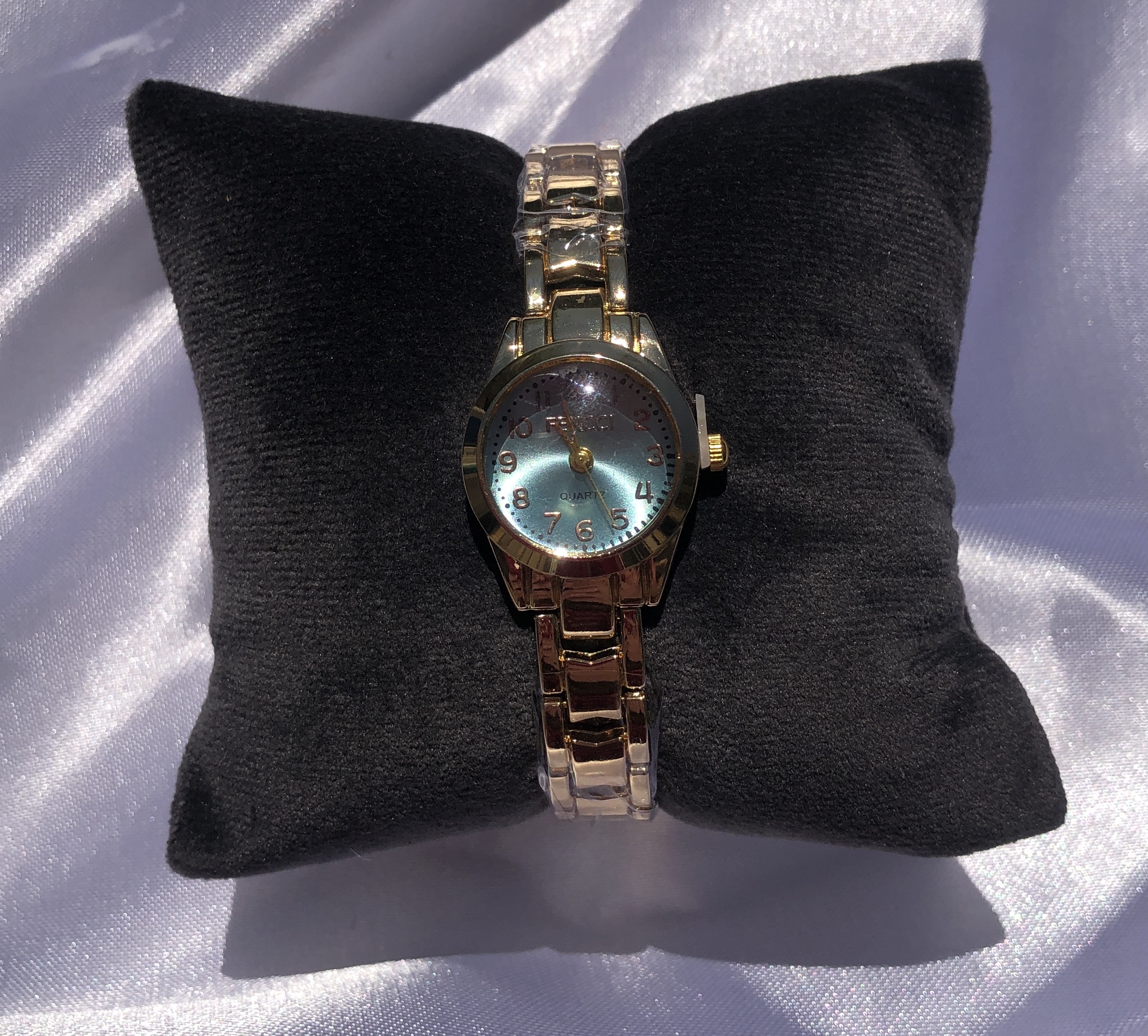 ساعت جواهری صفحه فیروزه ای طلایی زنانه